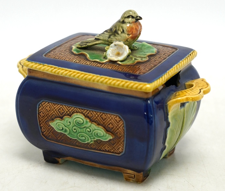 A small Minton majolica box and cover, possibly after a design by Christopher Dresser, 13cm wide. Condition - poor